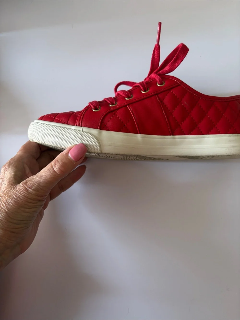 GUESS size 7.5 red quilted leather Sneakers with Gold Hardware very good shape